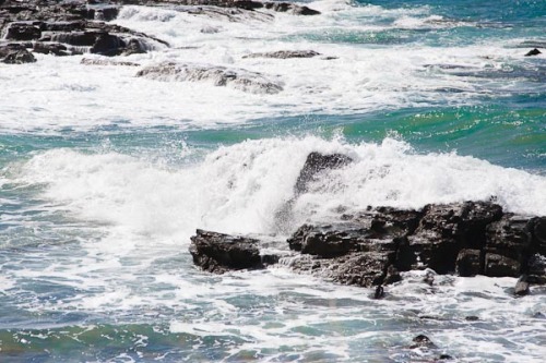 The sea washing over rocks.